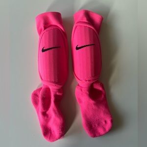 Girls Nike shin pads. Socks with the pads built in.